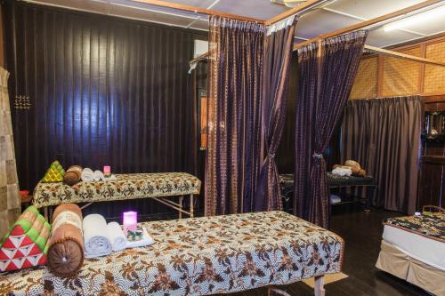 Letto o letti in una camera di Mutiara Taman Negara