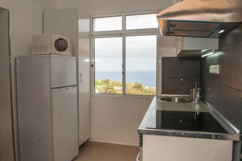 Dapur atau dapur kecil di Villa SCIROCCO Madeira - Ocean View