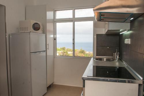 Nhà bếp/bếp nhỏ tại Villa SCIROCCO Madeira - Ocean View