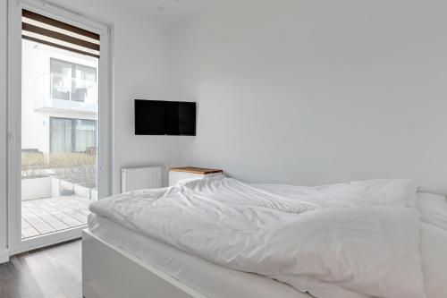 Posteľ alebo postele v izbe v ubytovaní VISBY : Premium Apartments on the Beach