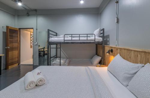 Ένα ή περισσότερα κρεβάτια σε δωμάτιο στο Otter House