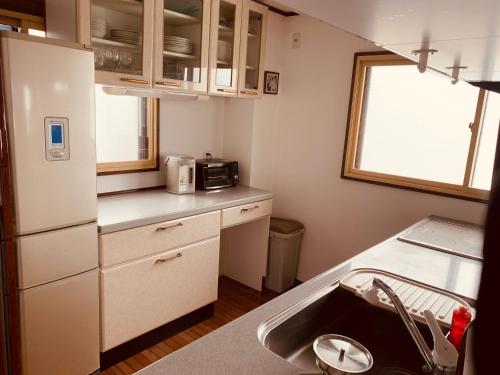 Dapur atau dapur kecil di Hakuba Ski Condos