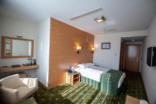 Gaziantep Plaza Hotelにあるベッド