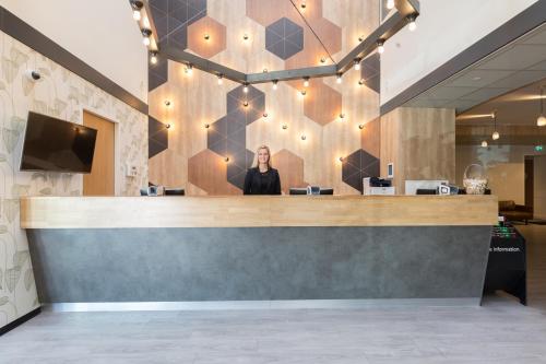 Телевизор и/или развлекательный центр в Best Western Amsterdam