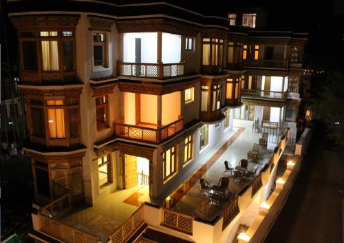an aerial view of a building at night at Himalayan Retreat-Karzoo in Leh