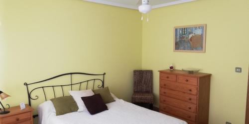 Postel nebo postele na pokoji v ubytování La Casita Camponaraya