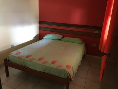 Cama ou camas em um quarto em Pousada Boramar