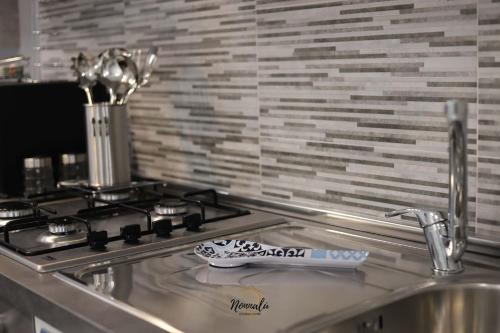 Dapur atau dapur kecil di Nonnalù Holiday Home