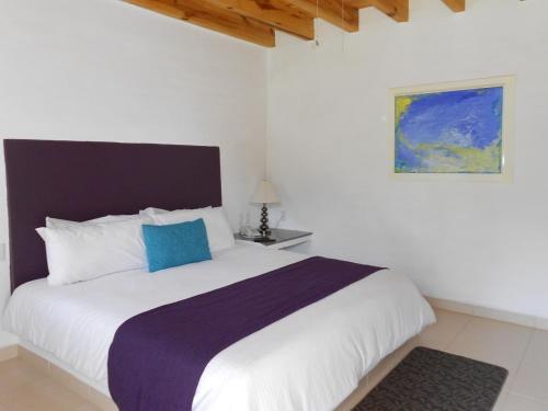 Katil atau katil-katil dalam bilik di Hotel La Ribereña