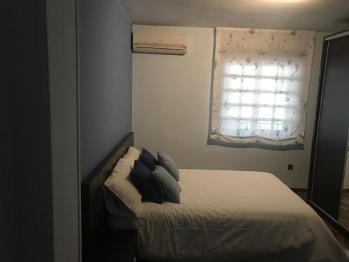 Ένα ή περισσότερα κρεβάτια σε δωμάτιο στο Vita House