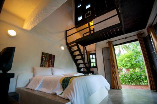 Postelja oz. postelje v sobi nastanitve Baan Pong Tara