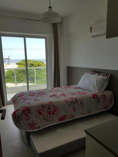Krevet ili kreveti u jedinici u okviru objekta Aparts da Praia Grande 301