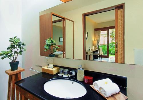 Kúpeľňa v ubytovaní Uma Karan