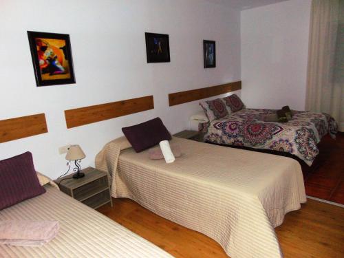 Ліжко або ліжка в номері Hostal Puerto de Santa Maria