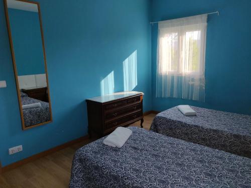Ένα ή περισσότερα κρεβάτια σε δωμάτιο στο Residencial El Cuartel