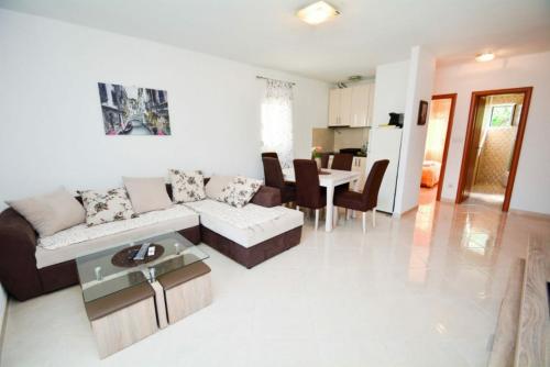 Zona de estar de Seaside apartments and rooms