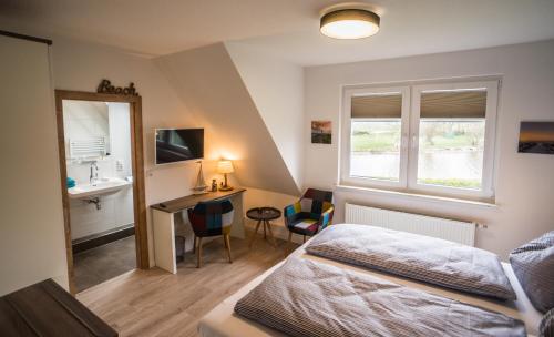 Postel nebo postele na pokoji v ubytování Hotel HaWattn
