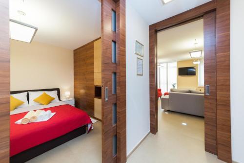 Postel nebo postele na pokoji v ubytování Apartment Main Street Zadar
