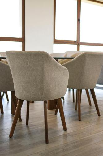 a group of chairs and a table in a room at Aizarker in La Plata