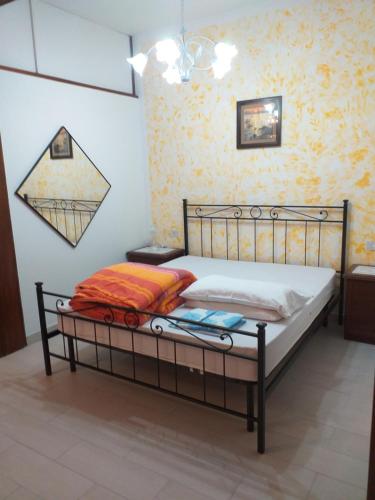 Cama o camas de una habitación en Appartamento Marina