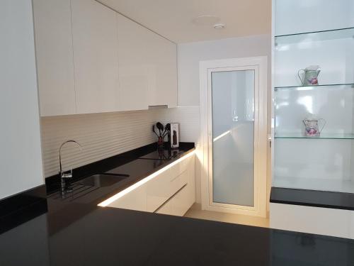Nhà bếp/bếp nhỏ tại Romero Apartments CALPE Arenal Beach