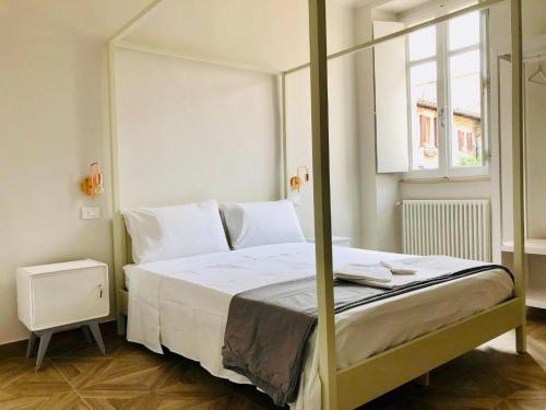 Postel nebo postele na pokoji v ubytování Sciri Suite #1