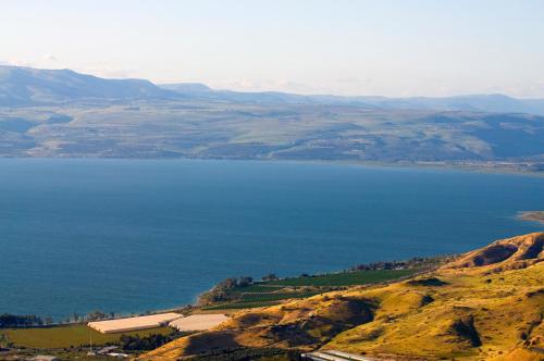 an aerial view of a large body of water at Club Hotel Tiberias - Suites Hotel in Tiberias