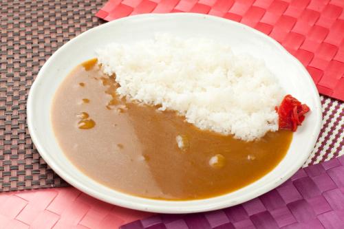 a plate of food with rice on a table at ホテルファインシエル鳥取砂丘店 - 大人専用 in Tottori