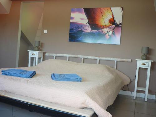 Letto o letti in una camera di Les Gites De Robinson