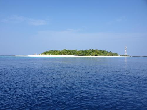 an island in the middle of a large body of water at Sea View Villa Ukulhas in Ukulhas