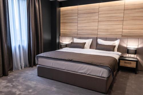 Postel nebo postele na pokoji v ubytování Hotel Del Corso