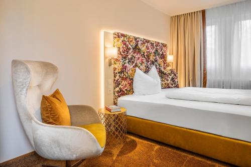 Ένα ή περισσότερα κρεβάτια σε δωμάτιο στο Hotel Menge "An der Schlacht"