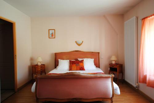 En eller flere senge i et værelse på La Janenquelle