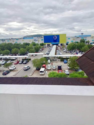 a view of a parking lot with cars parked at Davao 2br One Oasis Beside SM Mall-Wifi in Davao City