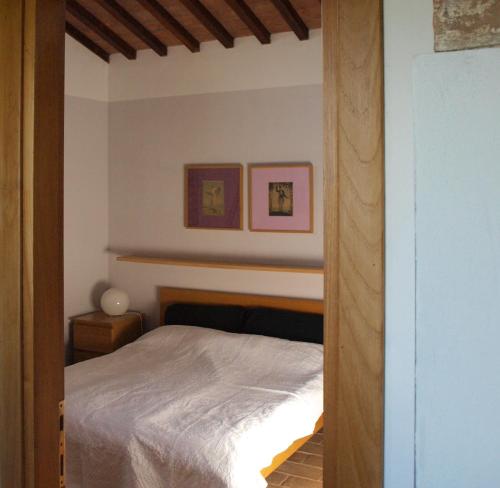 Poggio Magginga tesisinde bir odada yatak veya yataklar