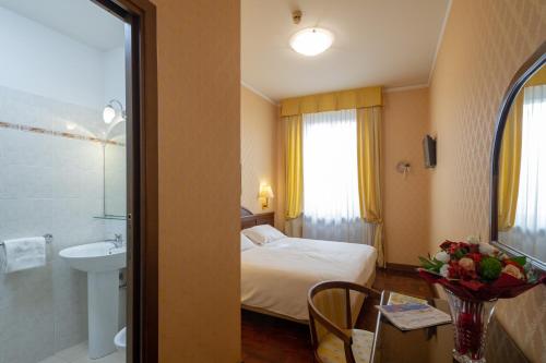 Koupelna v ubytování Hotel Boccaccio