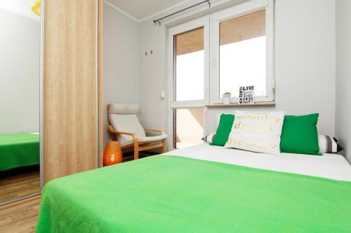 Ένα ή περισσότερα κρεβάτια σε δωμάτιο στο Blue River - Mosiezna