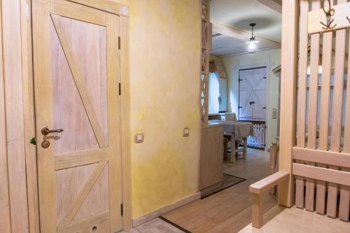 an open door in a room with a kitchen at Apartments in the Center, Grodno in Grodno