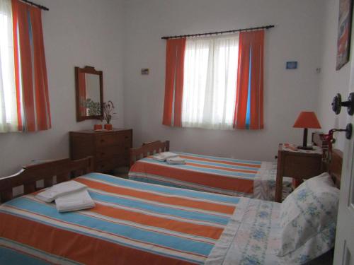Ένα ή περισσότερα κρεβάτια σε δωμάτιο στο West Coast Surf Hostel