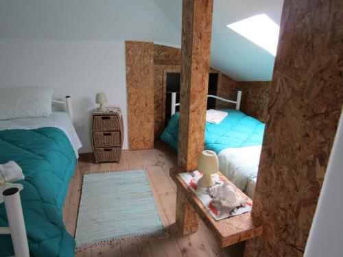 Ένα ή περισσότερα κρεβάτια σε δωμάτιο στο West Coast Surf Hostel