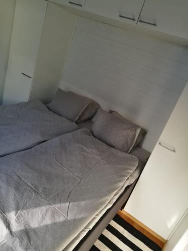 DP Apartments Vaasaにあるベッド