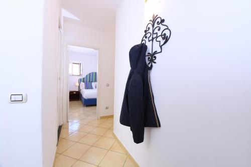 Katil atau katil-katil dalam bilik di Amalfitano Apartments