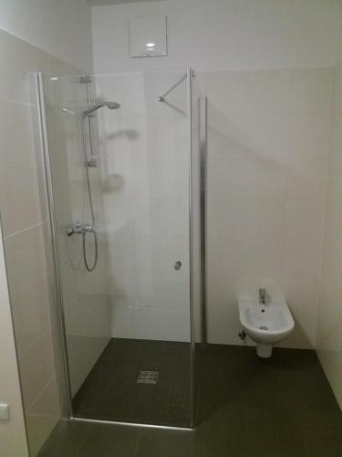 Ett badrum på Sonnenalpe Apartments Nassfeld