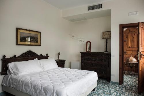 Postel nebo postele na pokoji v ubytování Villa delle Querce Resort