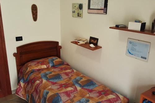 Katil atau katil-katil dalam bilik di La casa del viaggiatore