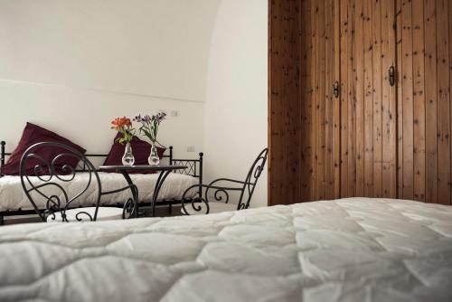 Postel nebo postele na pokoji v ubytování Villa delle Querce Resort
