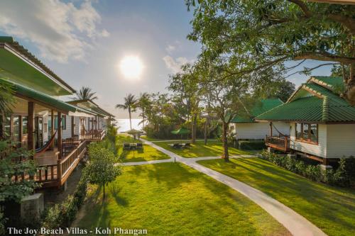 Κήπος έξω από το The Joy Beach Villas