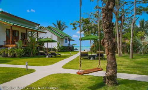 Κήπος έξω από το The Joy Beach Villas
