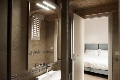Postel nebo postele na pokoji v ubytování Villa delle Querce Resort