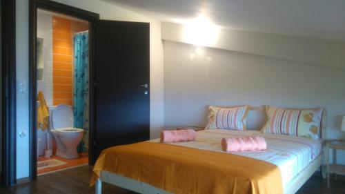 Posteľ alebo postele v izbe v ubytovaní Maisonette close to the beach